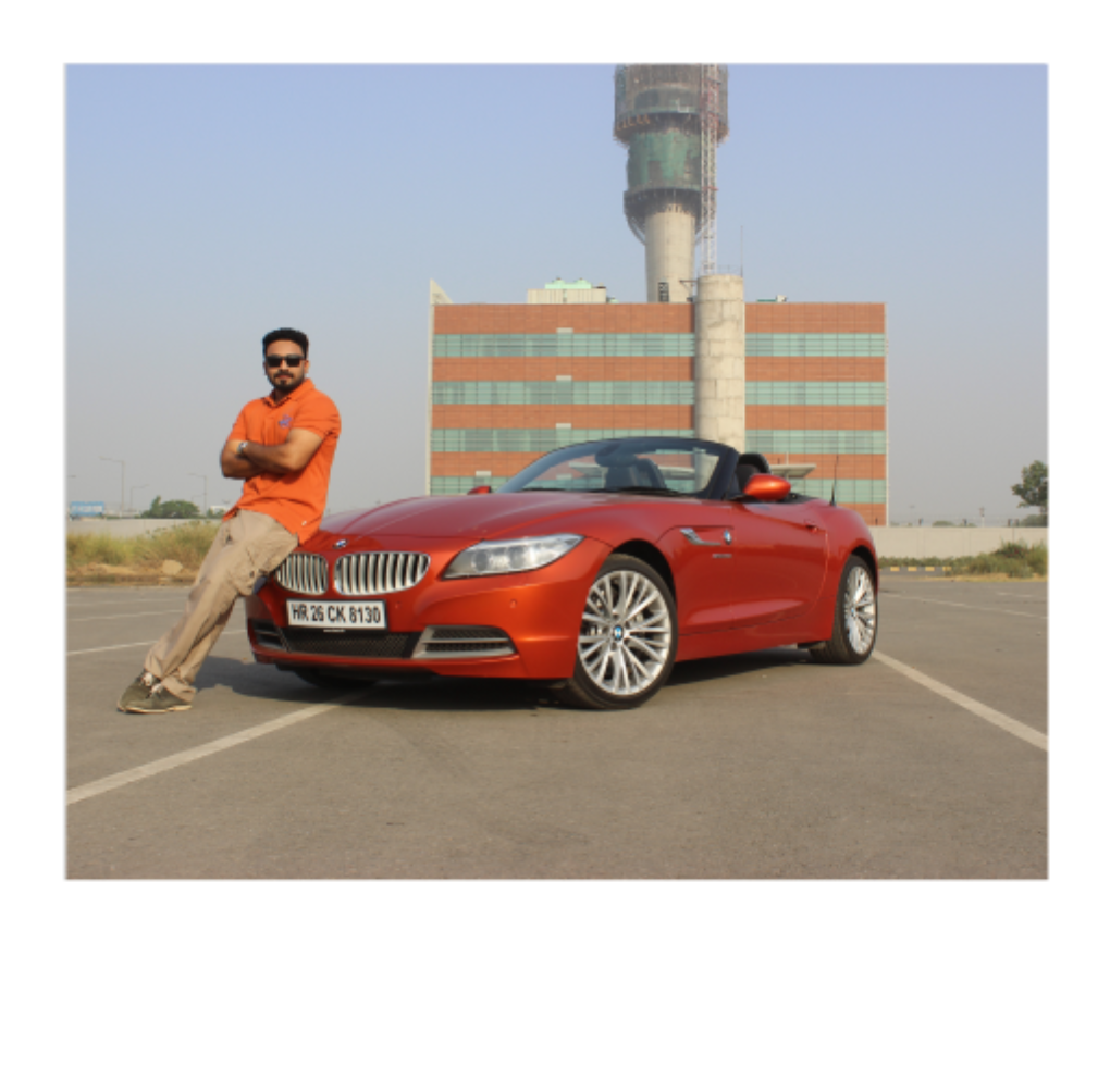 Orange BMW and automotive journalist in south india